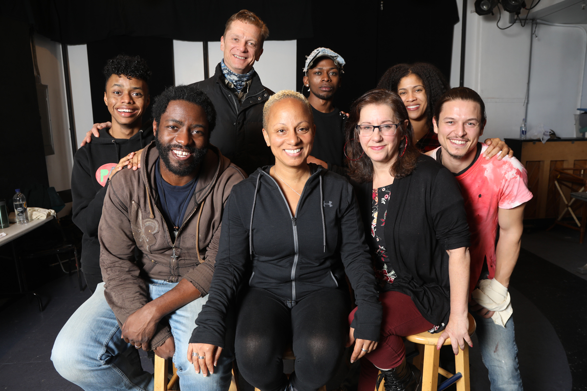 Professors Chuk Obasi and Kimani Fowlin grouped with the cast of Red Sky