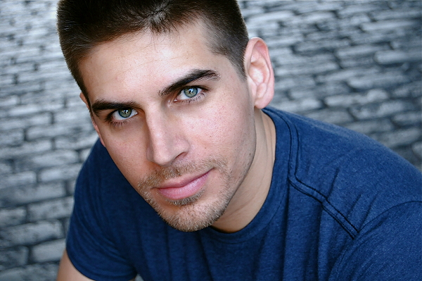 Smiling face of Carlos Andrés Gómez