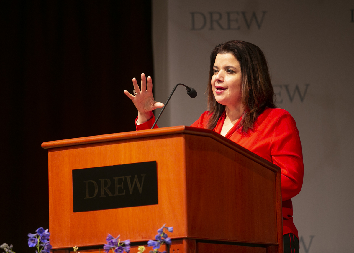 Ana Navarro speaking behind a Drew lectern