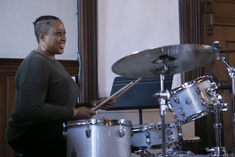 Theological School Student Tiffani Wheatley Accompanies On The Drums