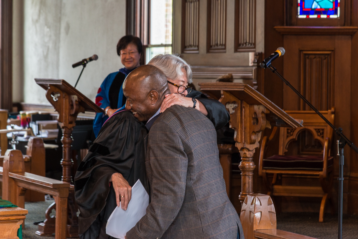 Zayzay Kpadeh and Professor Laurel Kearns hug.