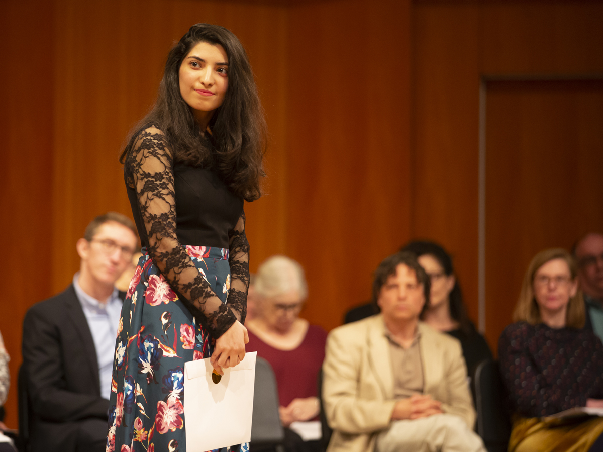 Zarina Akbary standing on stage
