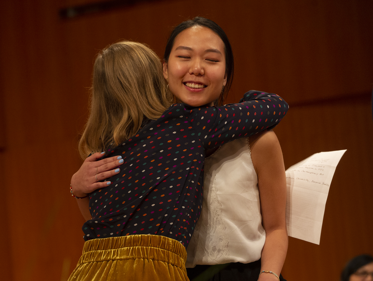 Professor Kimberly Rhodes hugs Inji Kim