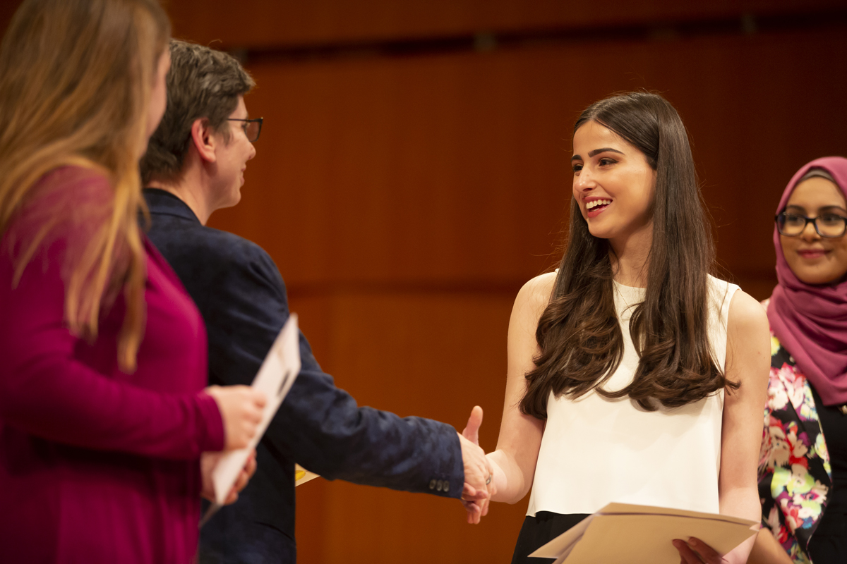 Provost Liebowitz shaking hands with Laila Hanandeh