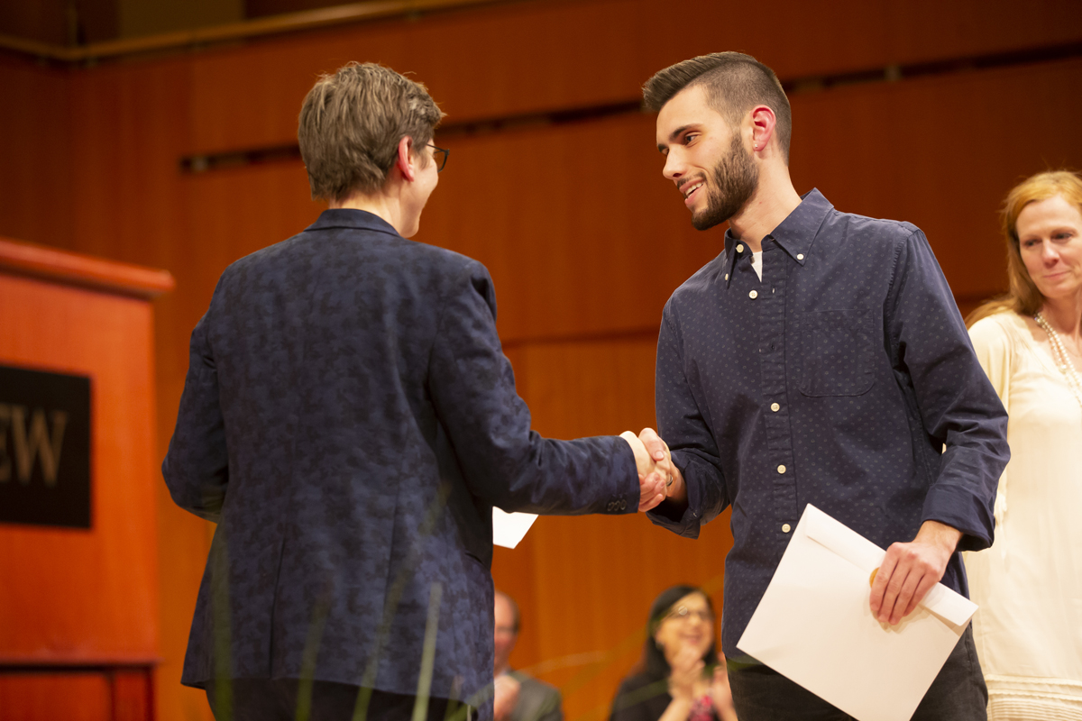 Provost Debra Liebowitz shaking hands with Alexander Pearce